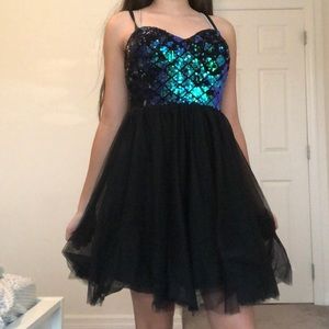 Short black dress.